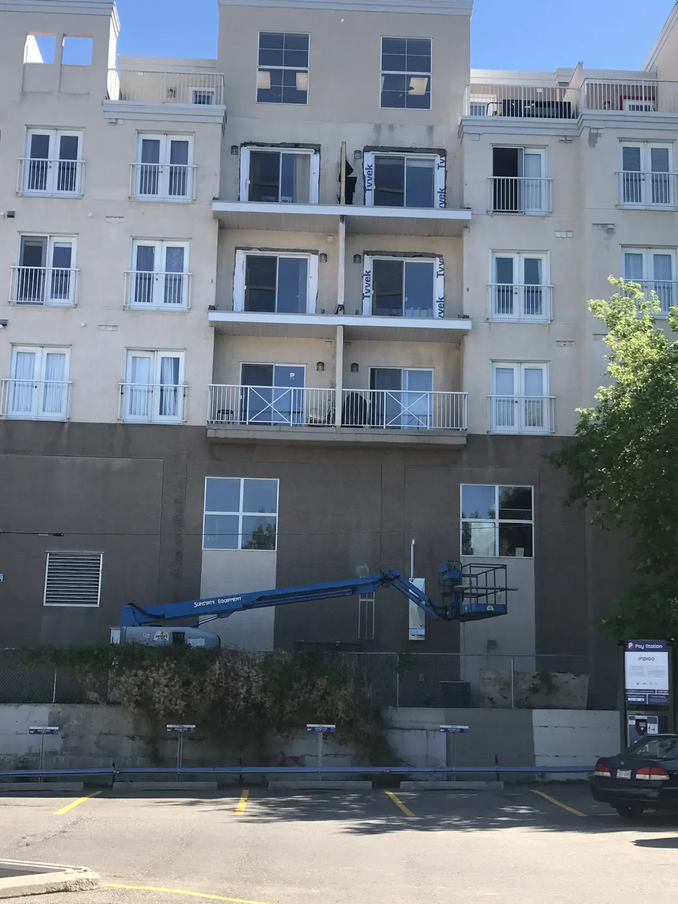 Multi-storey condo building during envelope and window replacement work
