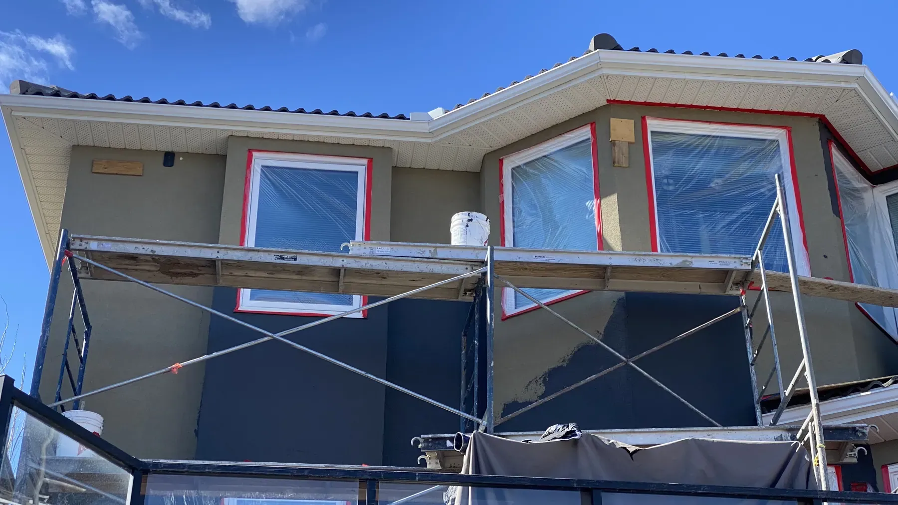 Window openings wrapped before the new stucco